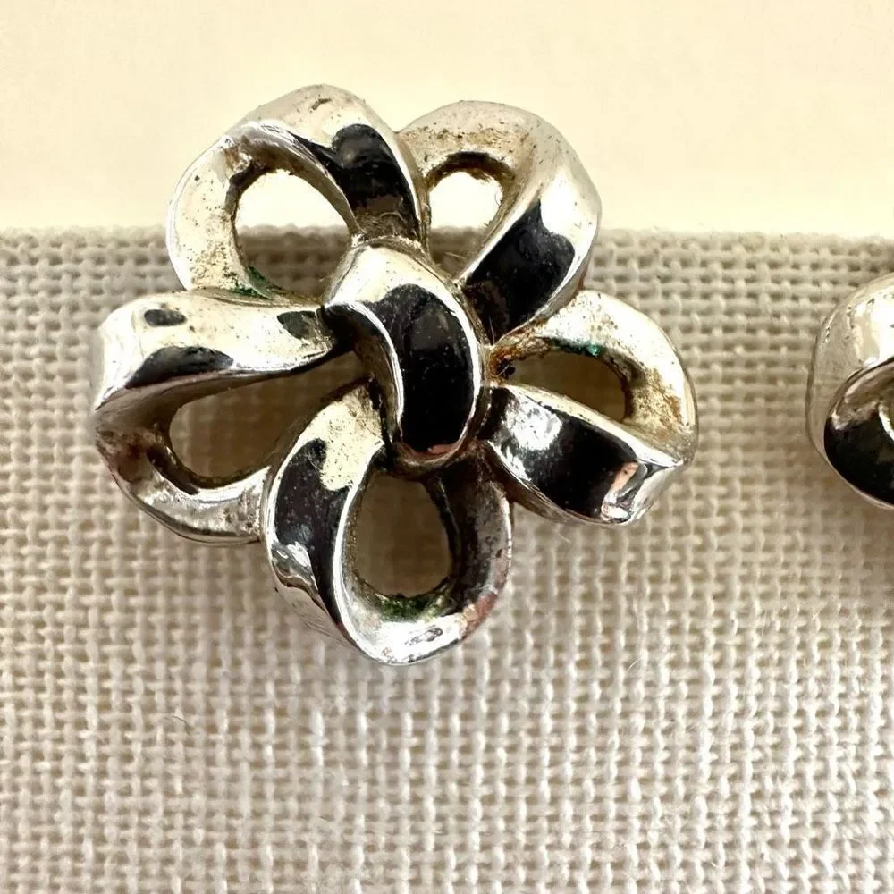 Trifari silver tone vintage clip on earrings